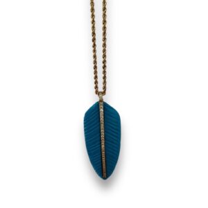 Feather with inlay