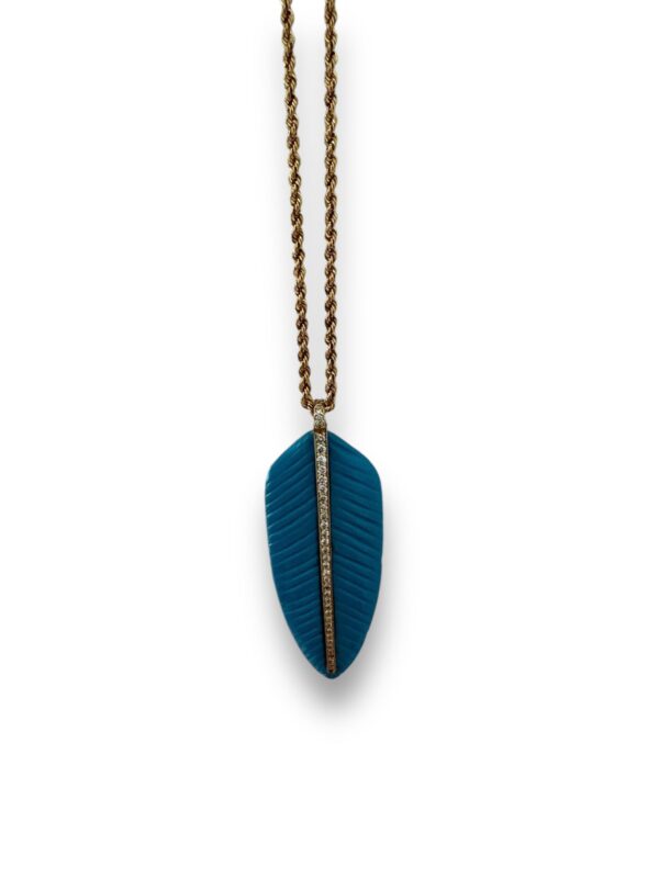Feather with inlay
