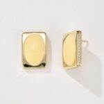 Side diamond and oval enamel cream banana earring